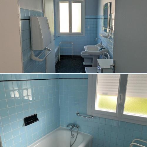 La salle de bains est pourvue de carrelage bleu, d'un lavabo et d'une baignoire. dans l'établissement Villa d'Azun, à Argelès-Gazost