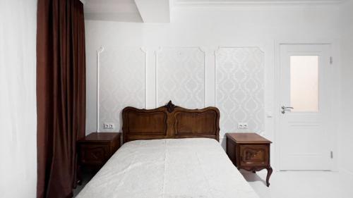 Un pat sau paturi într-o cameră la Rent&live apartment classic