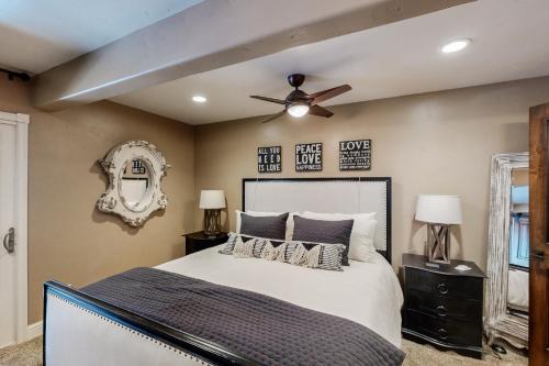 a bedroom with a bed and a ceiling fan at High Sierra Haven in Incline Village