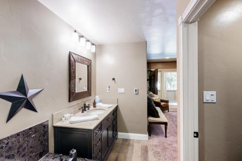 a bathroom with a sink and a star on the wall at High Sierra Haven in Incline Village