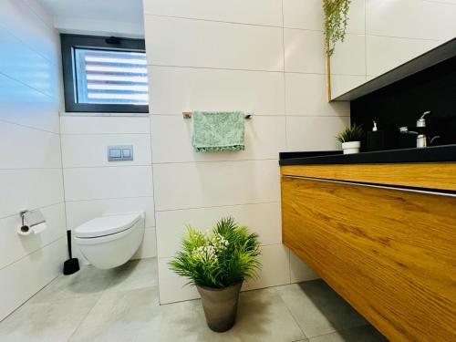 a bathroom with a toilet and a sink at Residence Kyrenia in Kyrenia