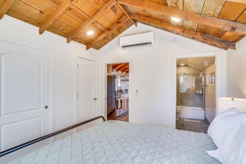 a bedroom with a bed and a ceiling at Cedar City Studio Retreat Patio, Fire Pit and Grill in Cedar City