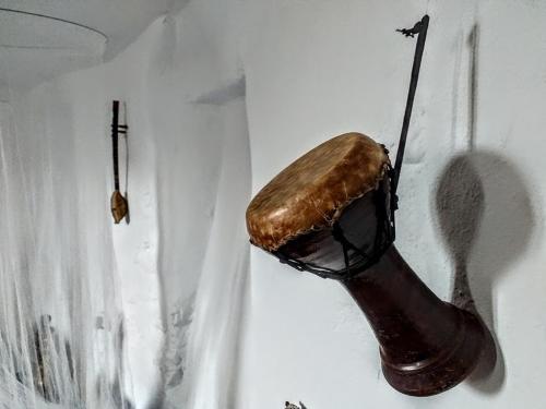 a spoon with a piece of chocolate on it at Posada Puente Romano in Sedella