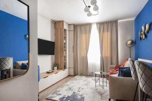 TV a/nebo společenská místnost v ubytování Cazare Poiana