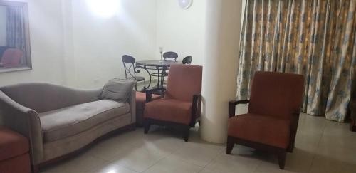 Posezení v ubytování Osu Apartment