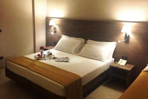 
Cama o camas de una habitación en Hotel Moderno
