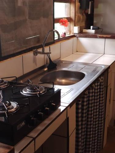 Η κουζίνα ή μικρή κουζίνα στο Casa Jasmim