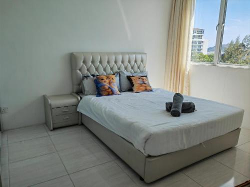 Postel nebo postele na pokoji v ubytování Homestay Pangsapuri Simfoni 3BR 7Pax Kuah Langkawi