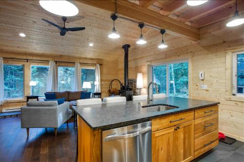 a kitchen with a sink and a counter top at 74sl - Pets Ok - Wifi - Bbq - Sleeps 8 in Glacier