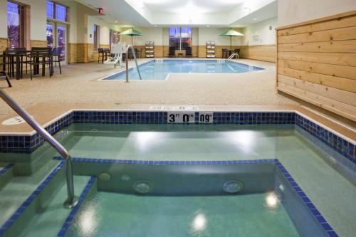 a swimming pool in a large room with at Hampton Inn Duluth-Canal Park in Duluth