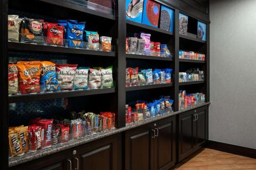 a refrigerator filled with lots of different types of snacks at Hampton Inn Evansville Airport in Evansville