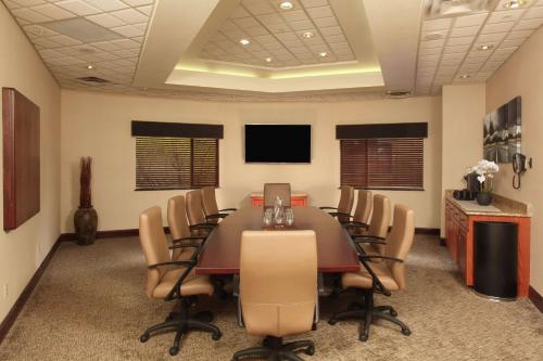 a conference room with a long table and chairs at Hampton Inn Kalispell in Kalispell