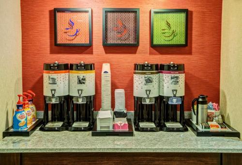 a group of wine bottles sitting on a counter at Hampton Inn & Suites Fort Myers Estero in Estero