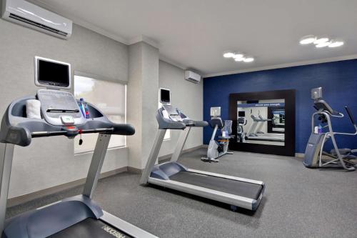 a room with a gym with a treadmill and a treadmill at Hampton Inn Greenwood in Greenwood