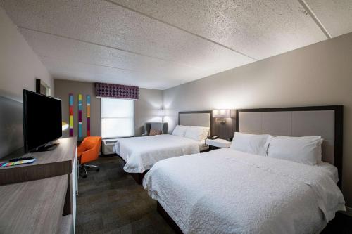 Postel nebo postele na pokoji v ubytování Hampton Inn Gainesville