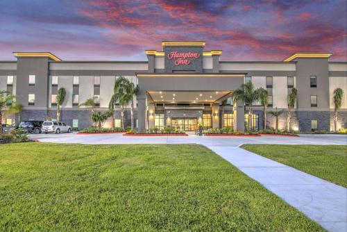 a rendering of the entrance to a shopping center at Hampton Inn Houston NASA-Johnson Space Center in Seabrook