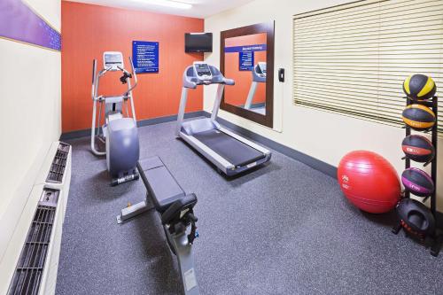 a gym with a treadmill and exercise equipment at Hampton Inn Jonesboro in Jonesboro