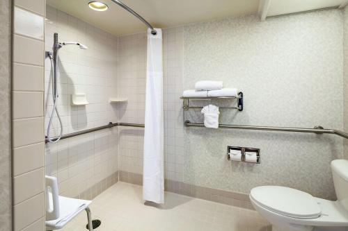 a bathroom with a toilet and a shower at DoubleTree by Hilton San Jose in San Jose