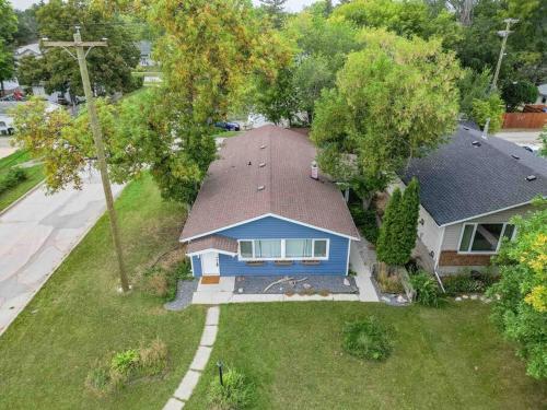 an overhead view of a house with a roof at Modern and Spacious Home in St. Vital in Winnipeg