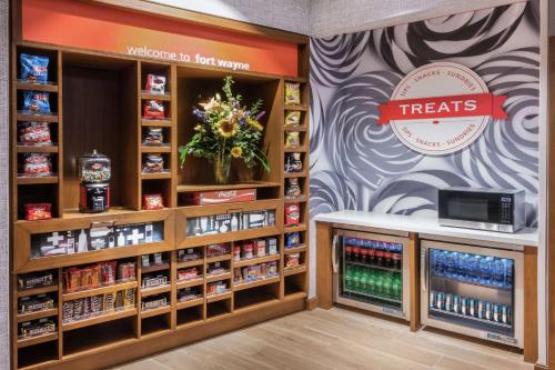 a treats store with a display of products at Hampton Inn & Suites Fort Wayne Downtown in Fort Wayne