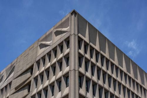 a tall building with a blue sky in the background at Hotel Marcel New Haven, Tapestry Collection By Hilton in New Haven