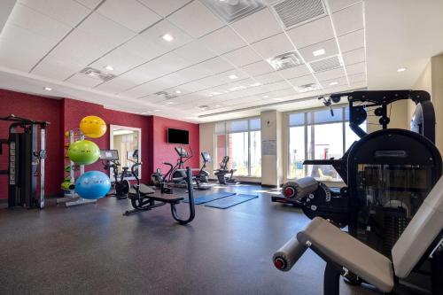 a gym with bikes and exercise equipment in a room at Tru By Hilton Galveston, Tx in Galveston