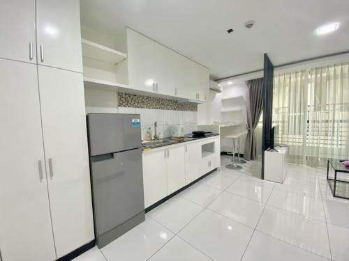 Una cocina o cocineta en PTH Residence