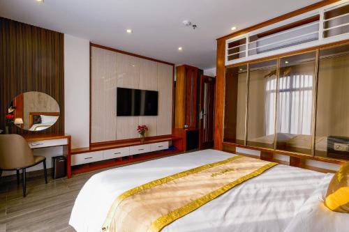 מיטה או מיטות בחדר ב-MIMOSA HOTEL