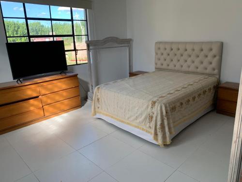Un pat sau paturi într-o cameră la Quinta La Florinda