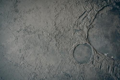 a stone wall with a circle in the middle at Original House in Chishang