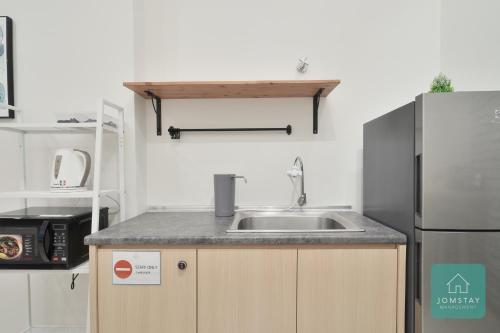 Kuchyň nebo kuchyňský kout v ubytování JOMSTAY Octagon Ipoh Suites