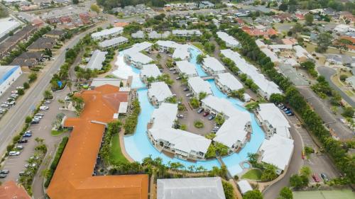 an aerial view of a park in a city at Oaks Port Stephens Pacific Blue Resort in Salamander Bay