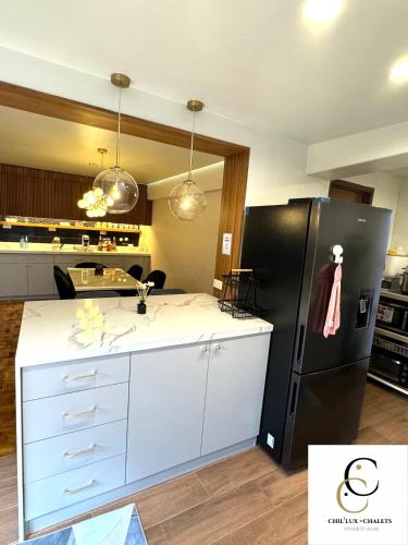 Kuchyň nebo kuchyňský kout v ubytování Chil'ux Chalets