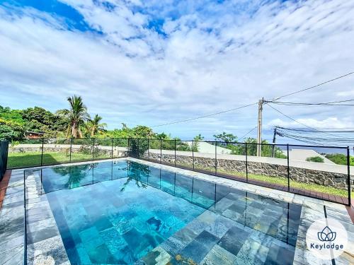 a swimming pool on top of a house at Villa One - avec piscine - 127m2 - Saint-Paul in Saint-Paul