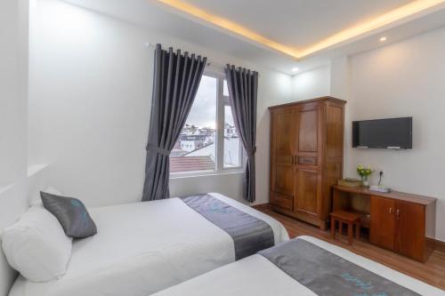 Postel nebo postele na pokoji v ubytování Cara Hostel & Spa