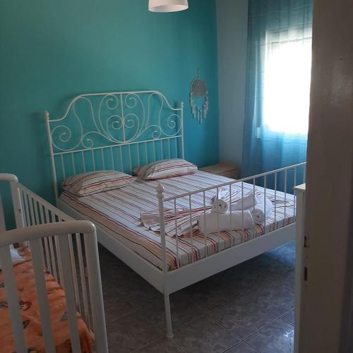 Ένα ή περισσότερα κρεβάτια σε δωμάτιο στο Boho beach house