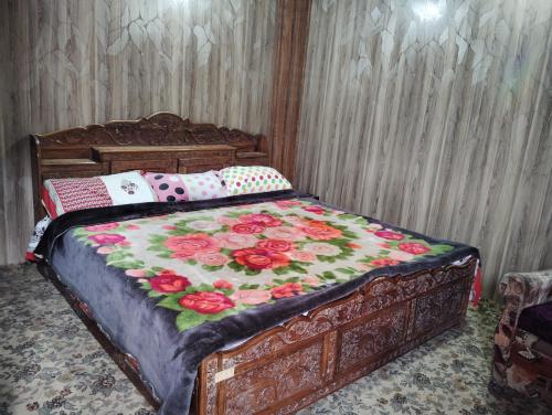 Uma cama ou camas num quarto em Guna guest house