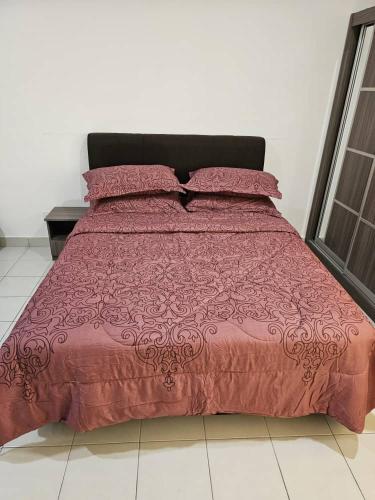 Katil atau katil-katil dalam bilik di A&H Homestay Seberang Jaya with Swimming Pool