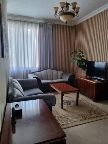 Ein Sitzbereich in der Unterkunft The Residence Hotel