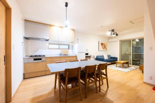Una cocina o cocineta en ecru住吉logement 1