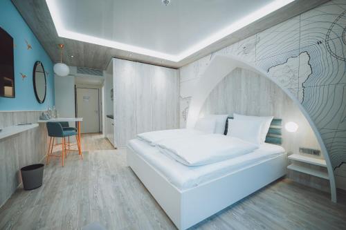 Voodi või voodid majutusasutuse Hotel Victory Therme Erding toas