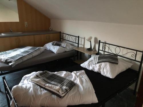 Postel nebo postele na pokoji v ubytování Monteurzimmer WG Zimmer Kurzzeitmieter *in
