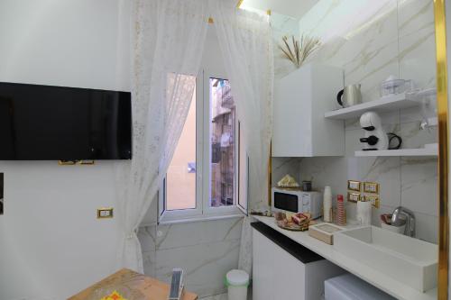 Η κουζίνα ή μικρή κουζίνα στο Regina House