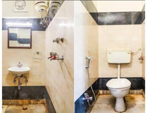 a bathroom with a toilet and a sink at Hotel Ashoka Inn, Kanpur in Kānpur