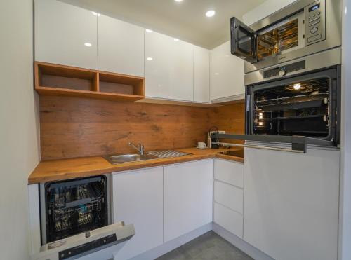 Kjøkken eller kjøkkenkrok på BelVie Residence