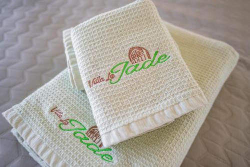 a close up of a napkin on a bed at Villa La Jade Chaweng Noi 2BR in Chaweng Noi Beach