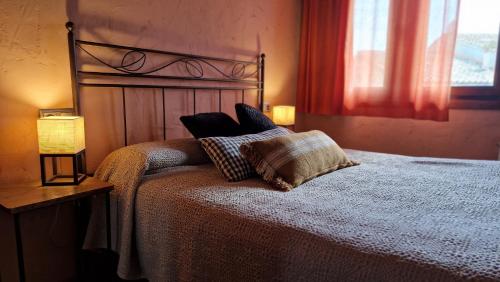 Ένα ή περισσότερα κρεβάτια σε δωμάτιο στο Ca L'Estamenya