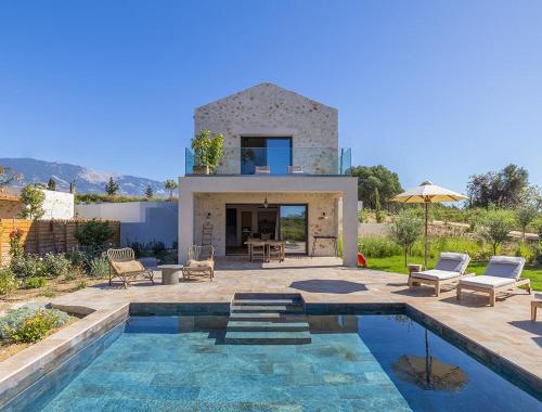 Bazén v ubytování Eliamos Villas Hotel & Spa nebo v jeho okolí