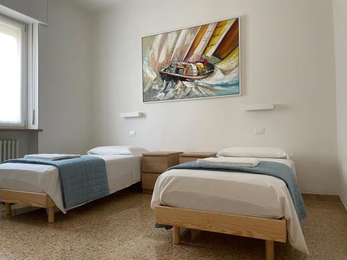 Cama ou camas em um quarto em Palazzo Antoniazzi