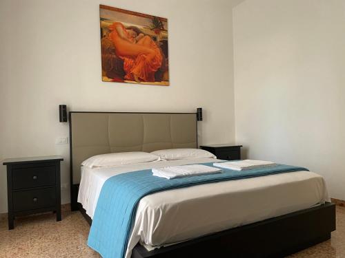 Cama ou camas em um quarto em Palazzo Antoniazzi